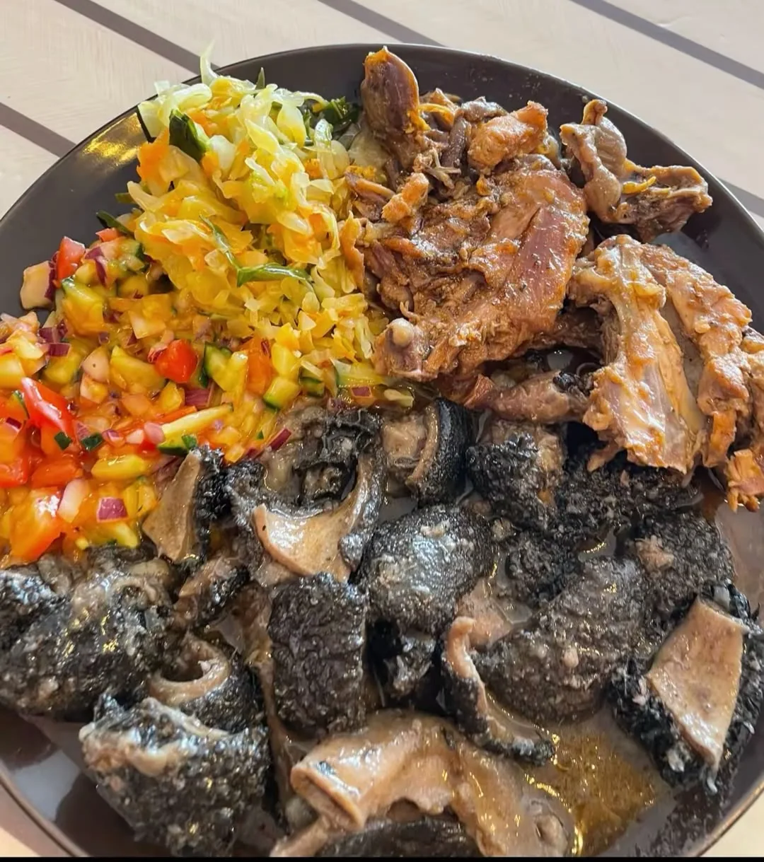 Traditional African Hardbody Chicken stewed with aromatic herbs and spices at AJ's Kitchen Pretoria